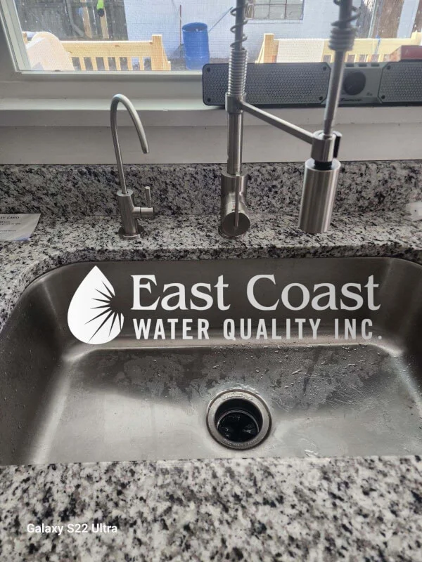 East Coast Water Quality Inc. install a kitchen sink with a dedicated filtered water tap.